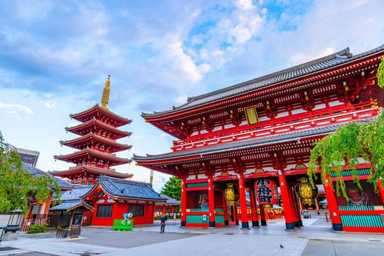 Vibrant red Hozomon Gate and a five-story pagoda at Senso-ji Temple in Asakusa, Tokyo.